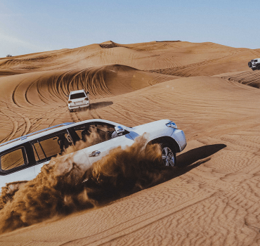 4x4's driving in desert