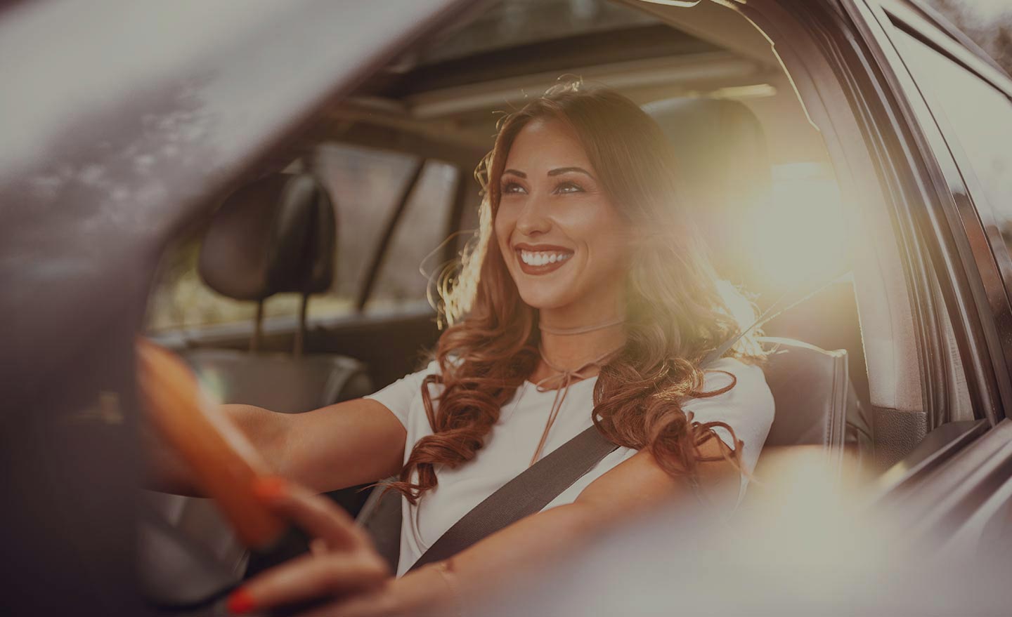 Woman Driving - Maintaining Your New Car